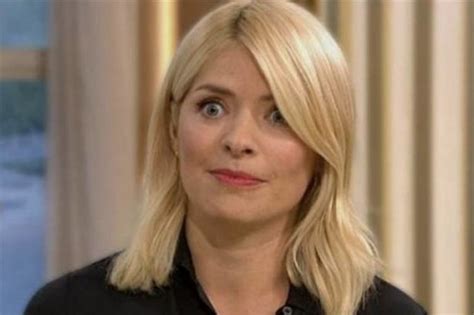 WATCH: Holly Willoughby flashes a BOOB live on kids TV in old clip